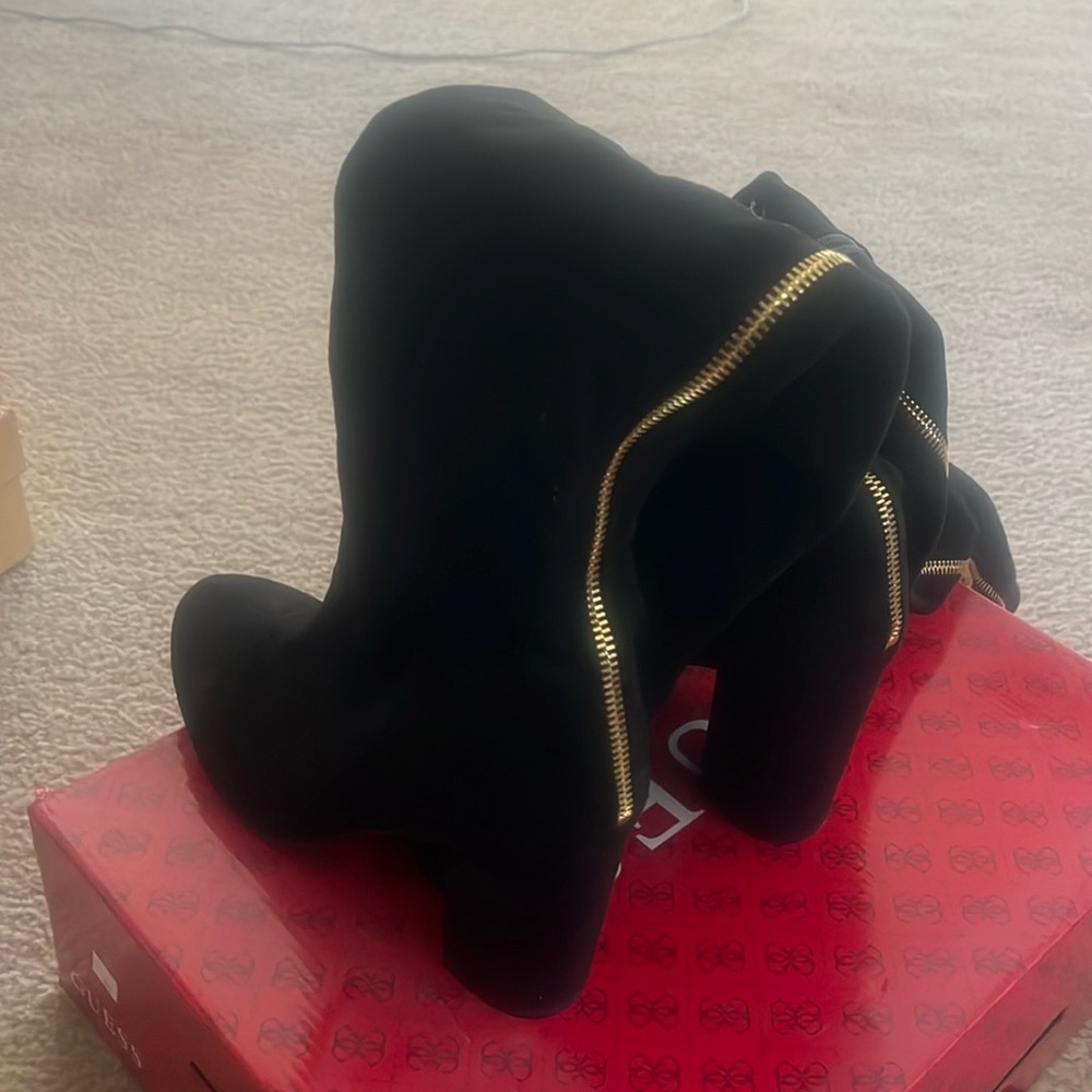 Guess black suede over the knee boot with gold zipper size 9 1/2. Brand new